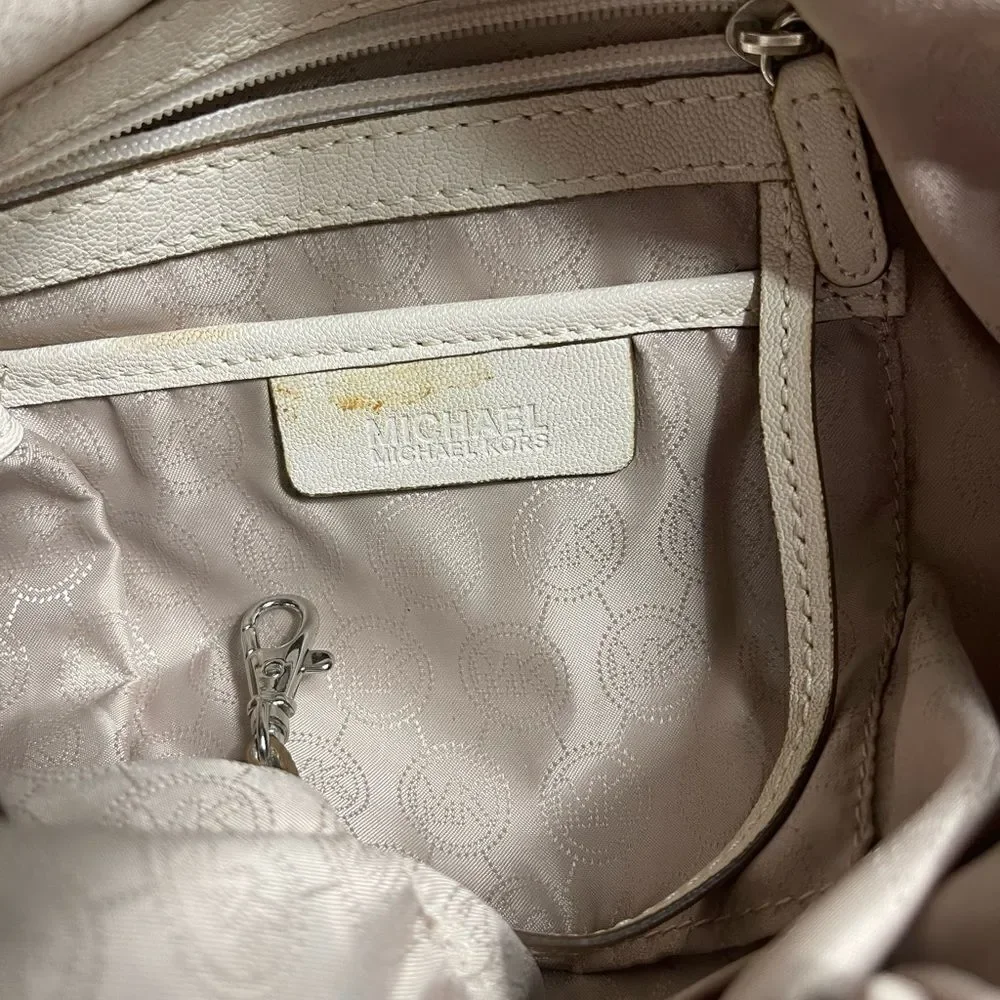 Michael Michael Kors leather beige drawstring bucket satchel.silver tone accents